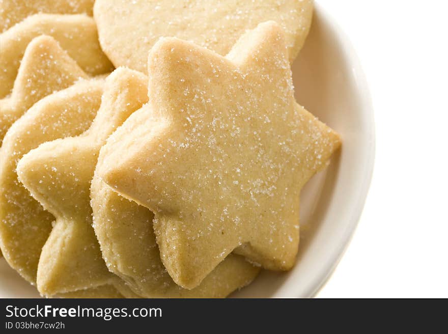 Star shaped homemade cookies in a white plate