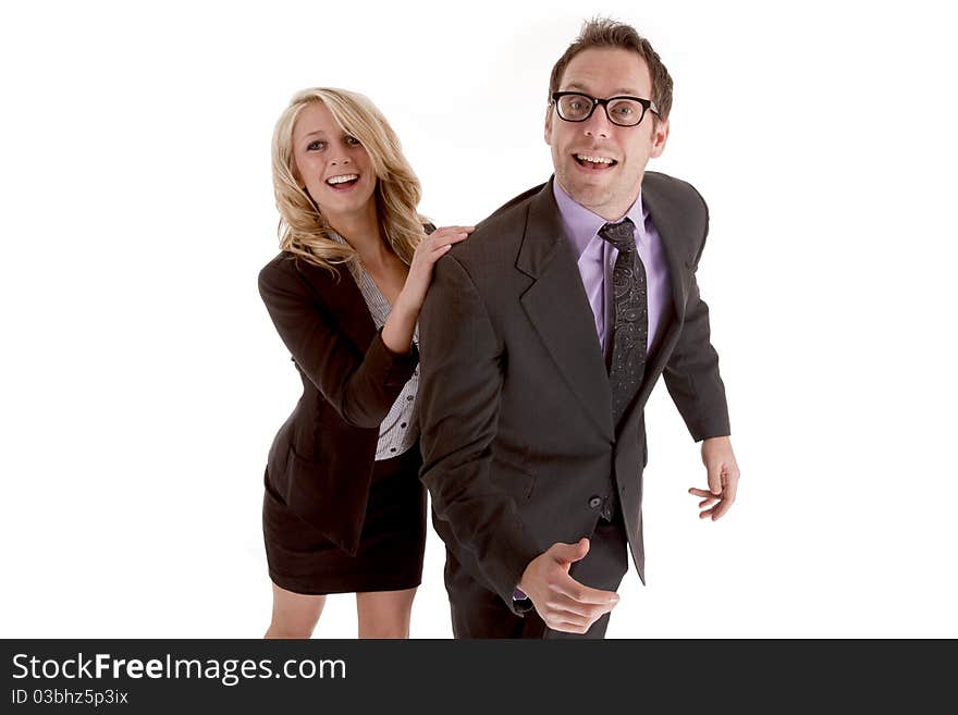 A business man and woman looking at the camera with happy smiles on their faces. A business man and woman looking at the camera with happy smiles on their faces.