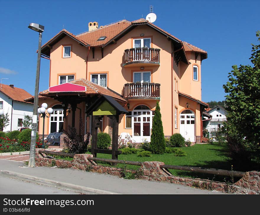 Modern family house with a lawn. Modern family house with a lawn