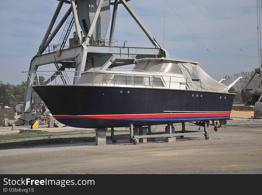 Travel and fishing boat in a dry