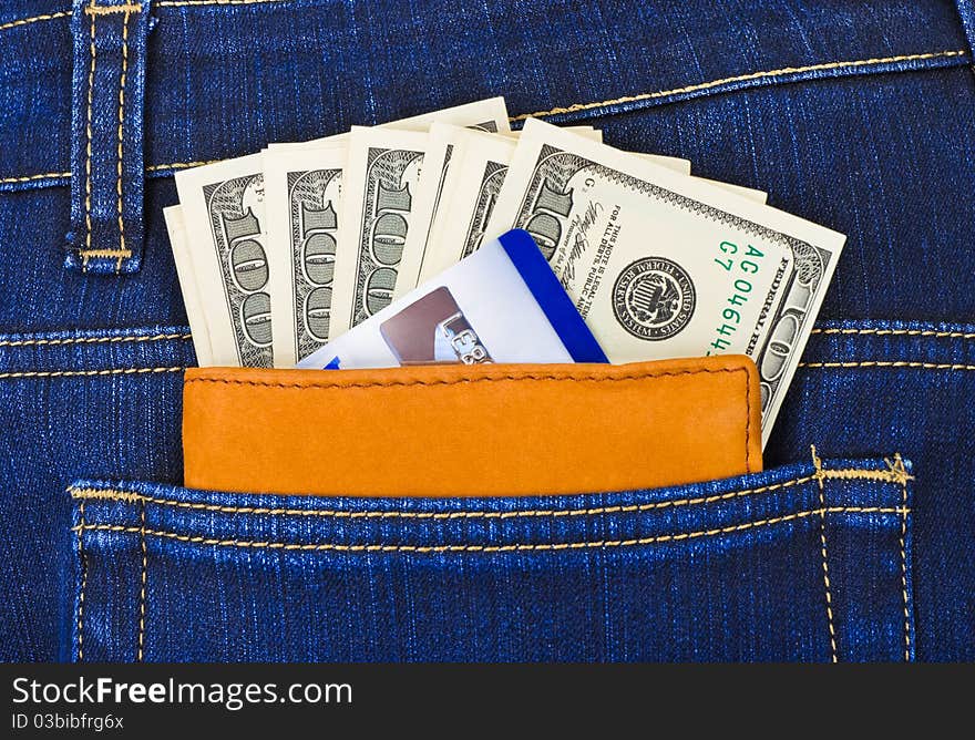 Money and credit card in jeans pocket