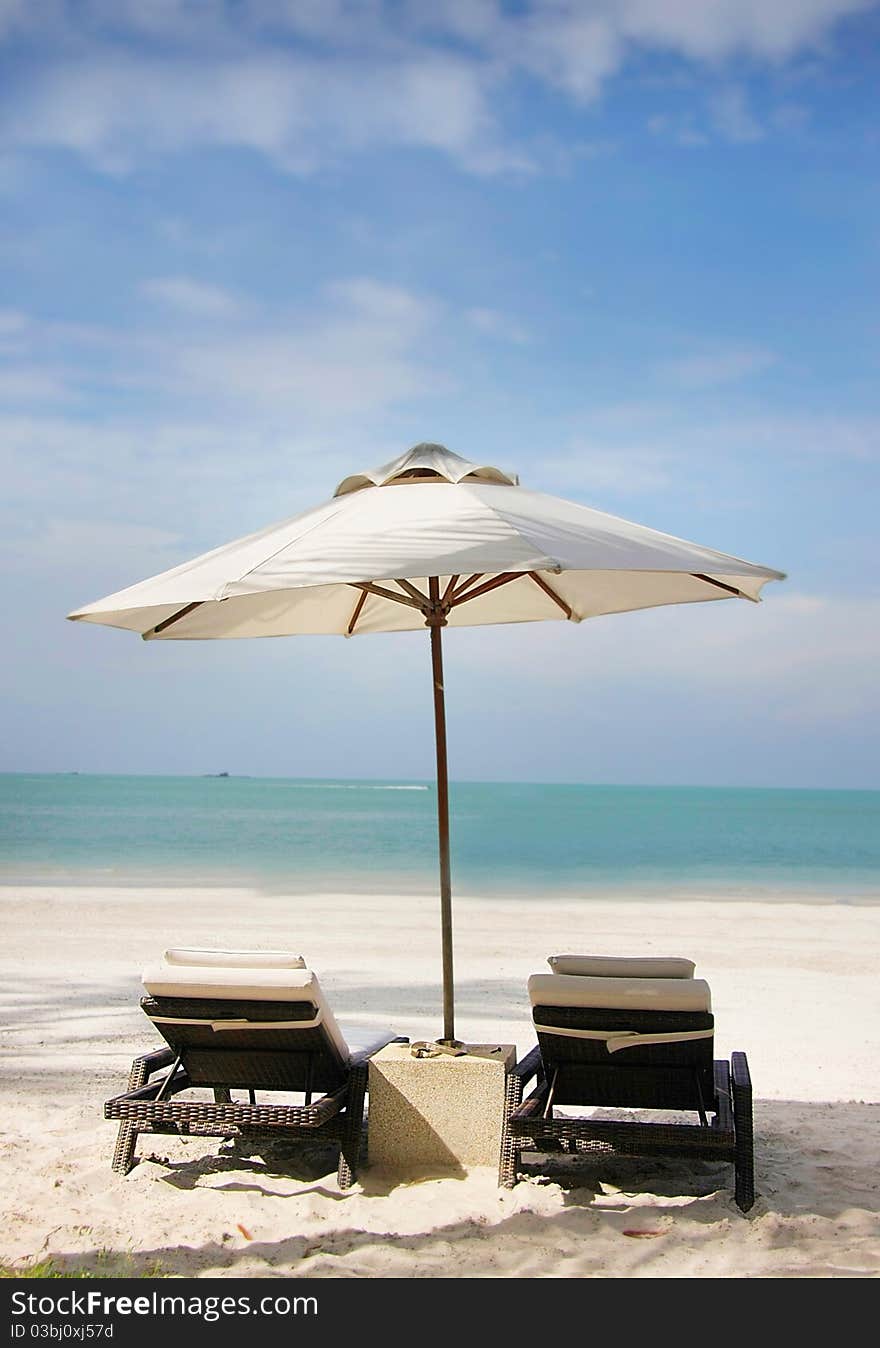 Chairs and umbrella on beach