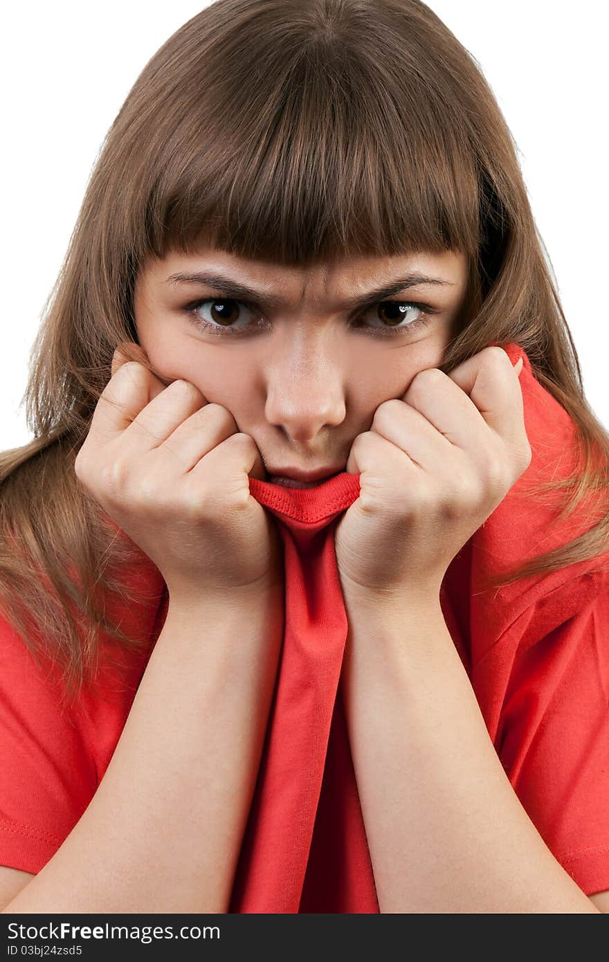 Portrait of the brunette in a red sweater isolated on a white background. Portrait of the brunette in a red sweater isolated on a white background