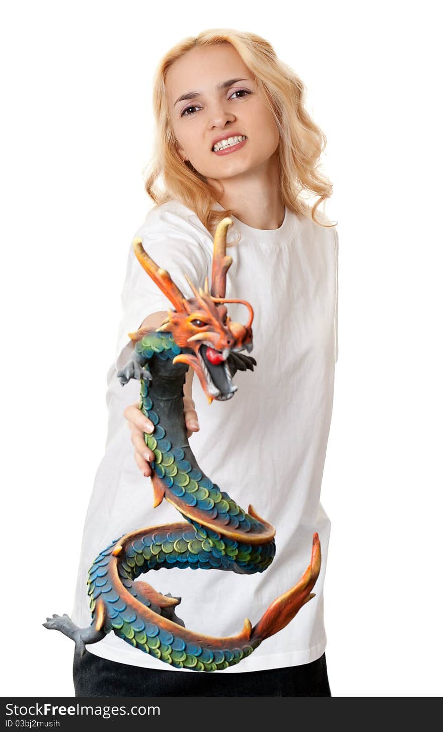 Beautiful girl with a wooden dragon