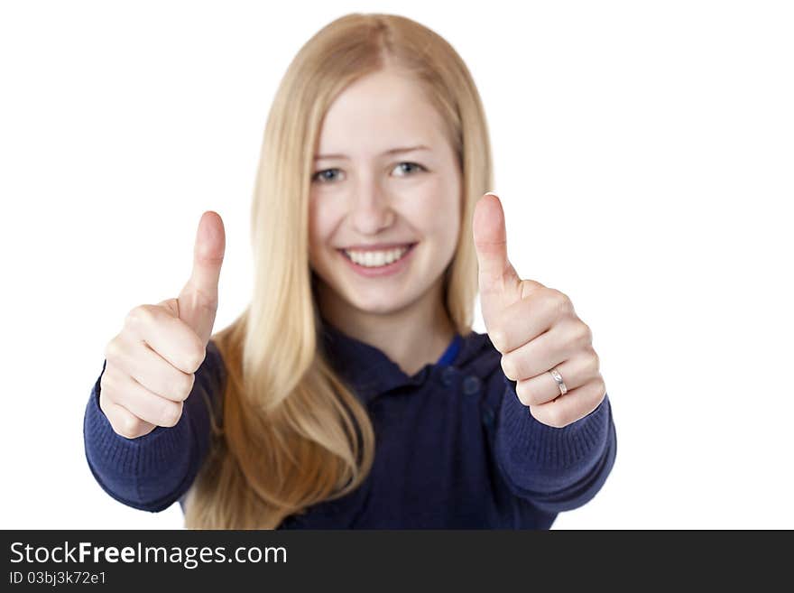 Young beautiful smiling woman shows both thumbs up. Isolated on white.