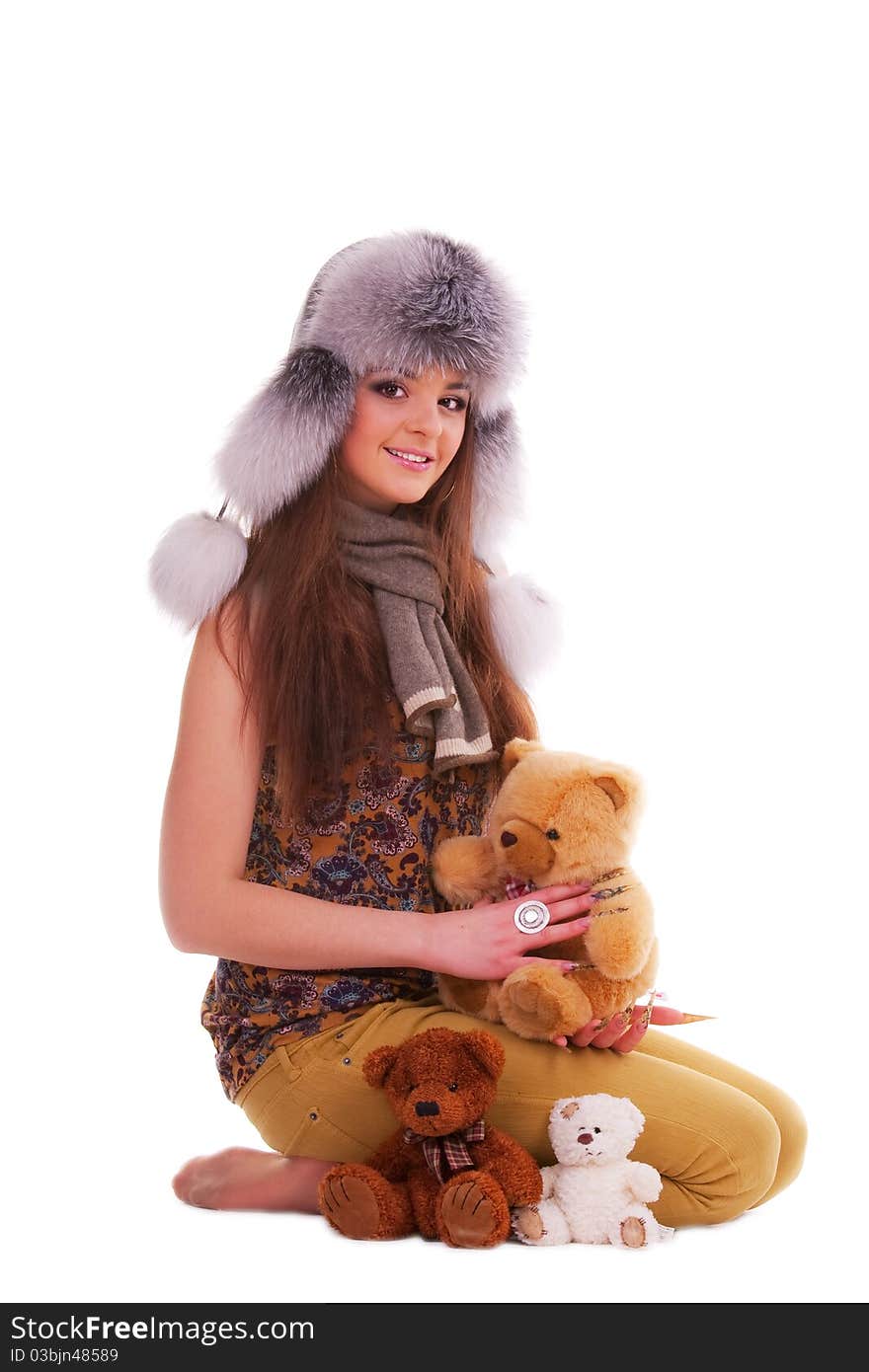 Beautiful longhair girl is holding the teddy bears. Beautiful longhair girl is holding the teddy bears