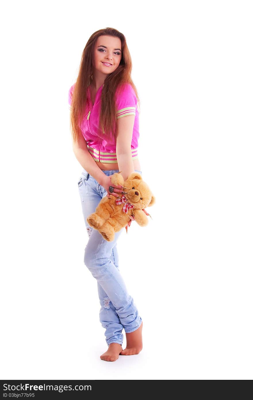 Beautiful longhair girl is holding the teddy bear. Beautiful longhair girl is holding the teddy bear