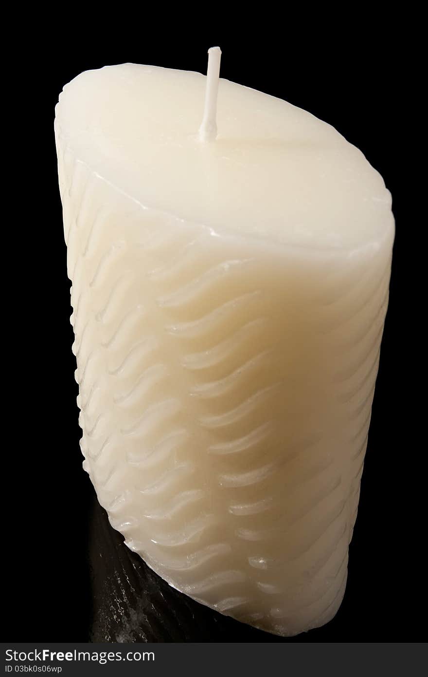 Candle on a black background