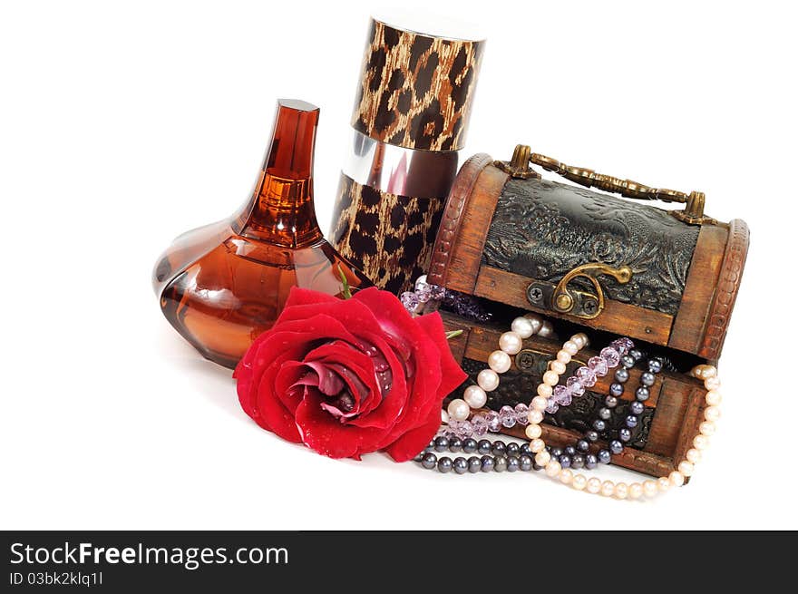 Wooden chest with pearls and perfumes  , isolated on white. Wooden chest with pearls and perfumes  , isolated on white