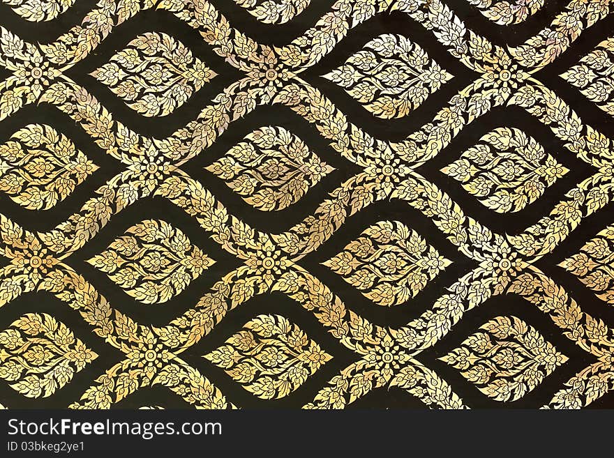 Thai Traditional golden ornament Painting Pattern on Temple door. Thai Traditional golden ornament Painting Pattern on Temple door