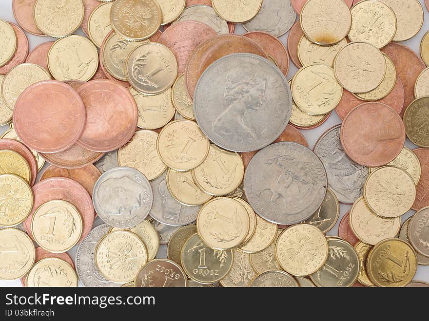 different coins on white background