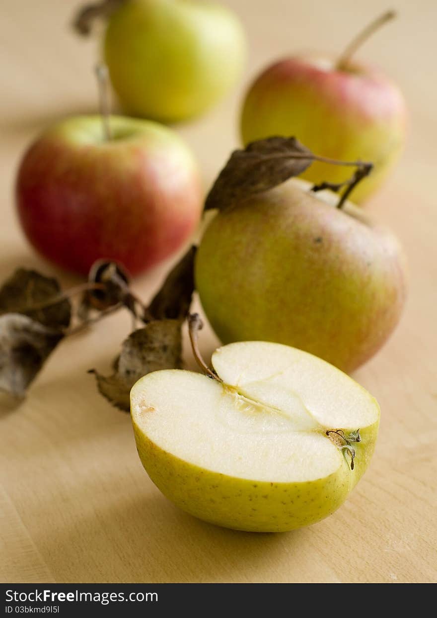 Fresh harvested apples on wooden board. Fresh harvested apples on wooden board