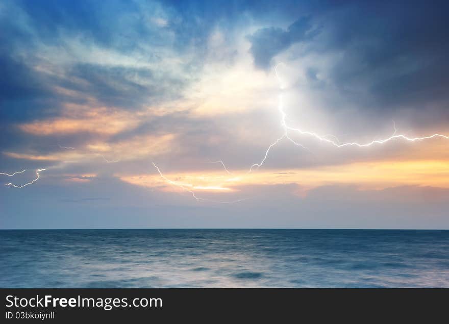 Rocks and sea storm. Dramatic scene. Composition of nature