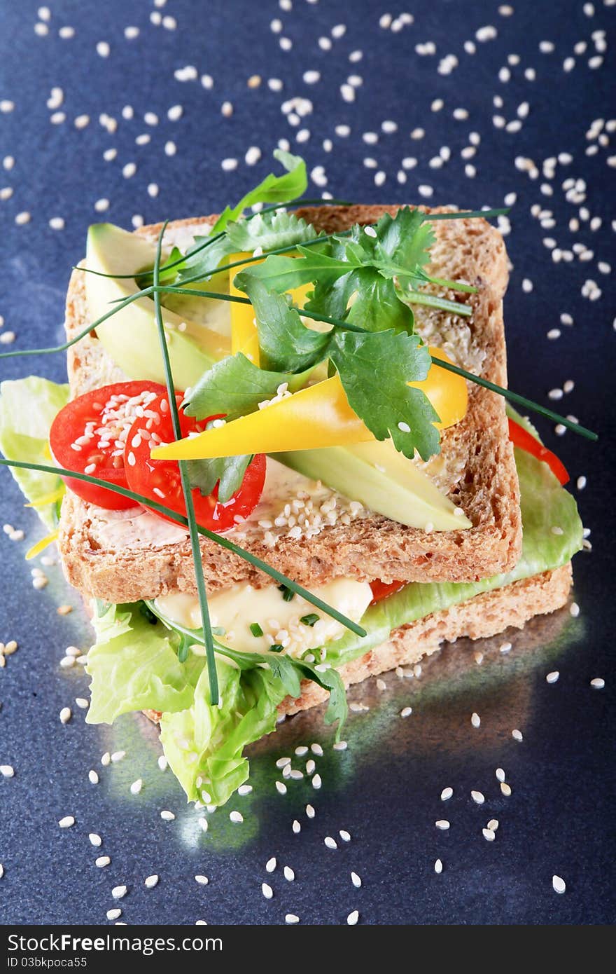 Whole grain sandwich bread and fresh vegetables. Whole grain sandwich bread and fresh vegetables