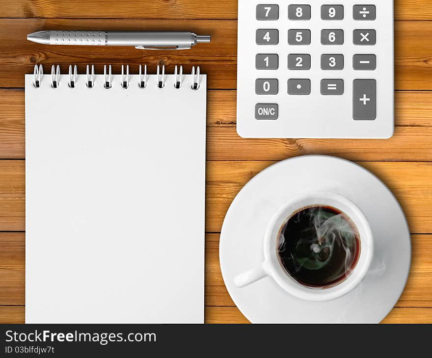 White calculator and white note paper with pen and white cup of hot coffee on Black table