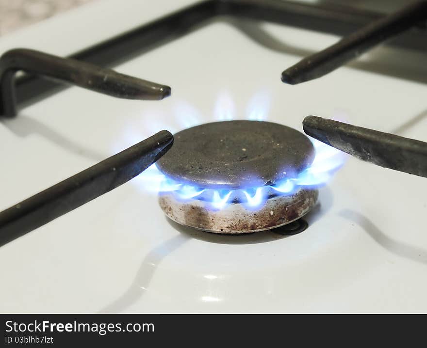 Burning natural gas on a plate