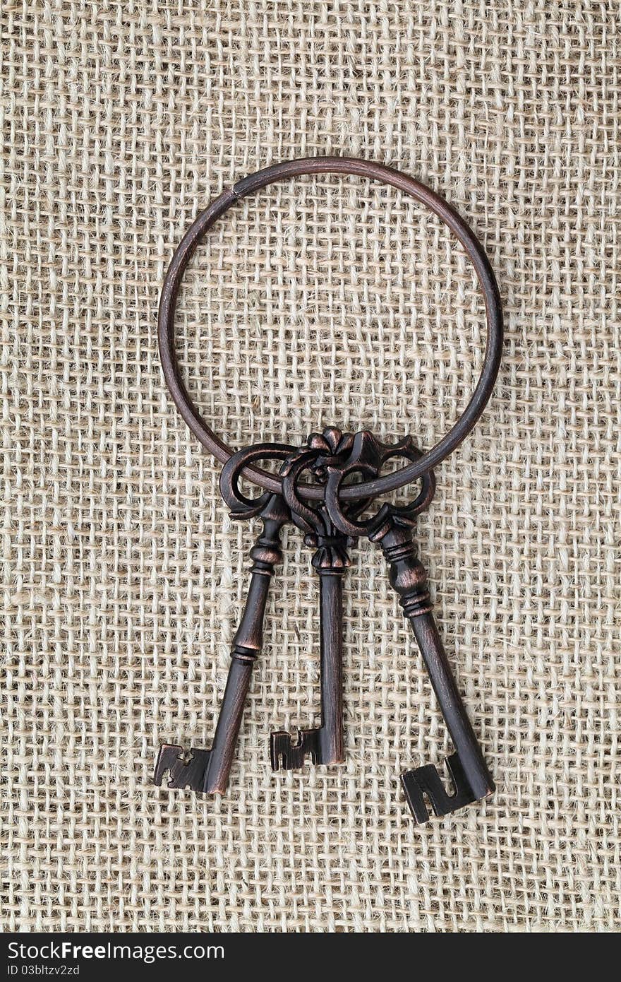 Old key on burlap hessian sacking