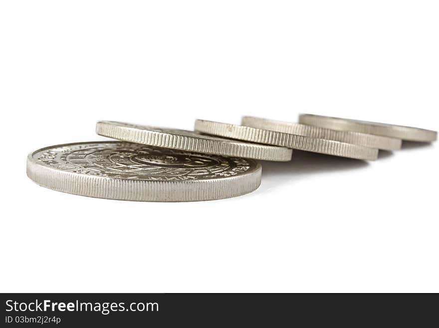 Silver coins on a white background. Silver coins on a white background