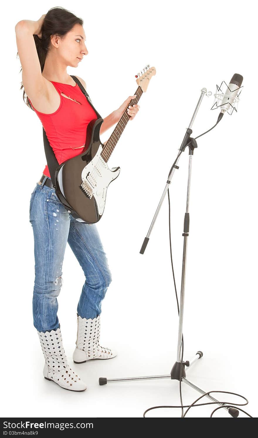 Girl with a guitar on a white background