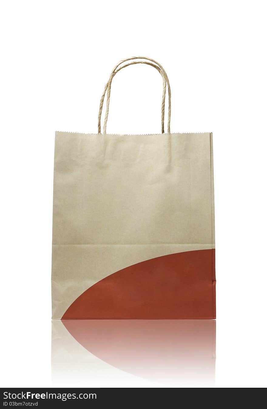 Brown paper bag on reflect floor and white background