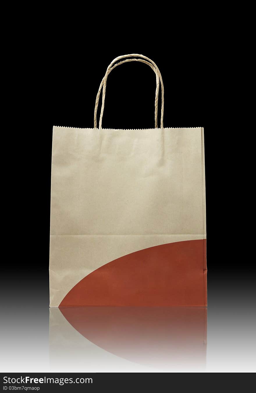 Brown paper bag on reflect floor and white background