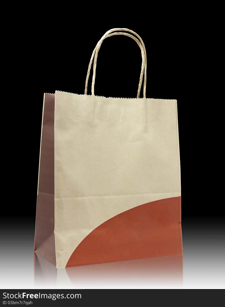 Brown paper bag on reflect floor and white background