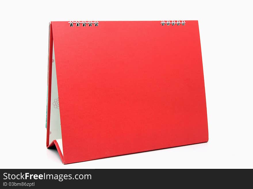 Red blank desktop calendar with isolated on white background