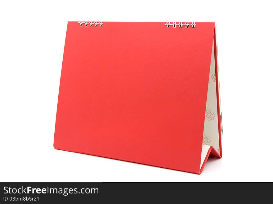 Red blank desktop calendar with isolated