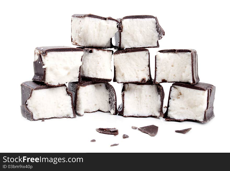 Delicious chocolate candy on a white background