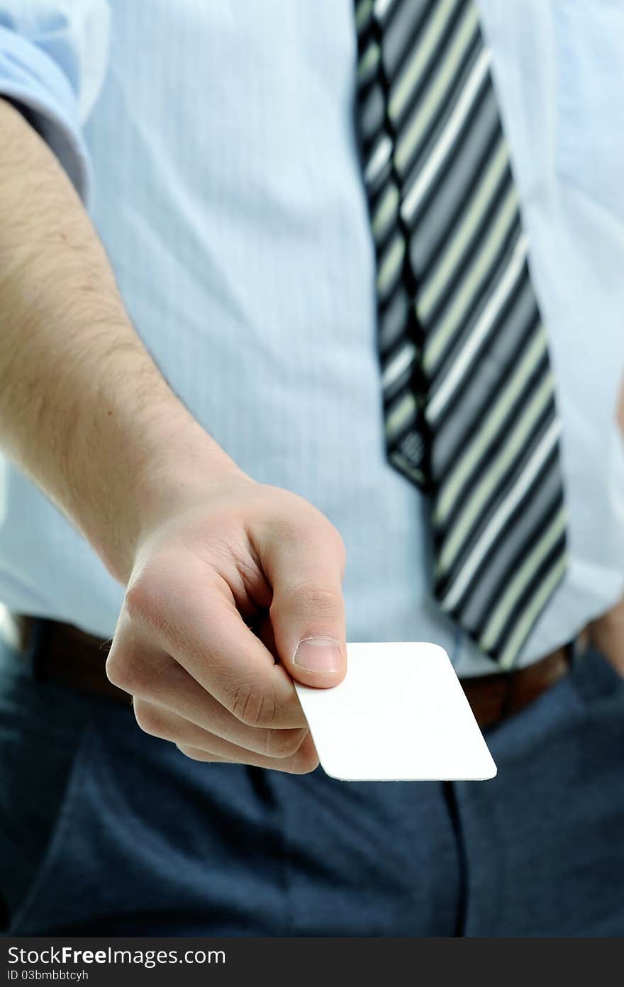 An image of businessman holding business card