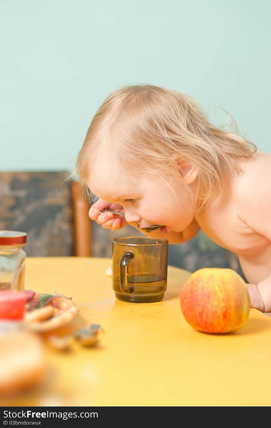 Adorable Baby Drink A Tea On Kitchen