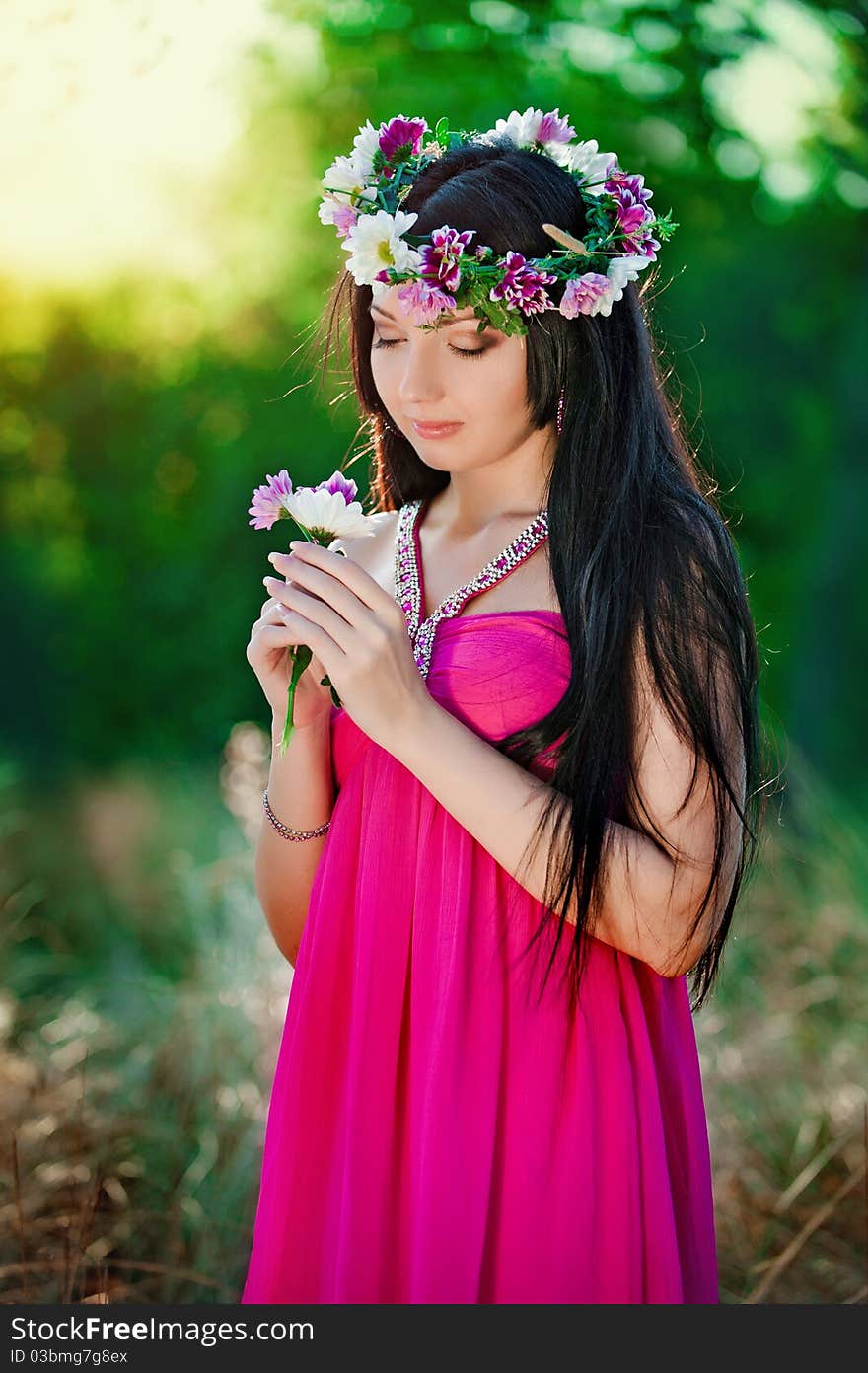 The beautiful girl on a glade in wood. The beautiful girl on a glade in wood