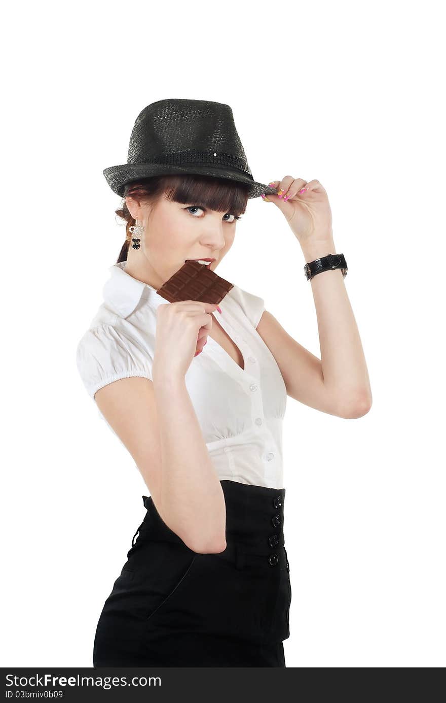 Young woman eating chocolate