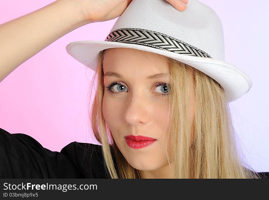 Beautiful european woman in a hat.