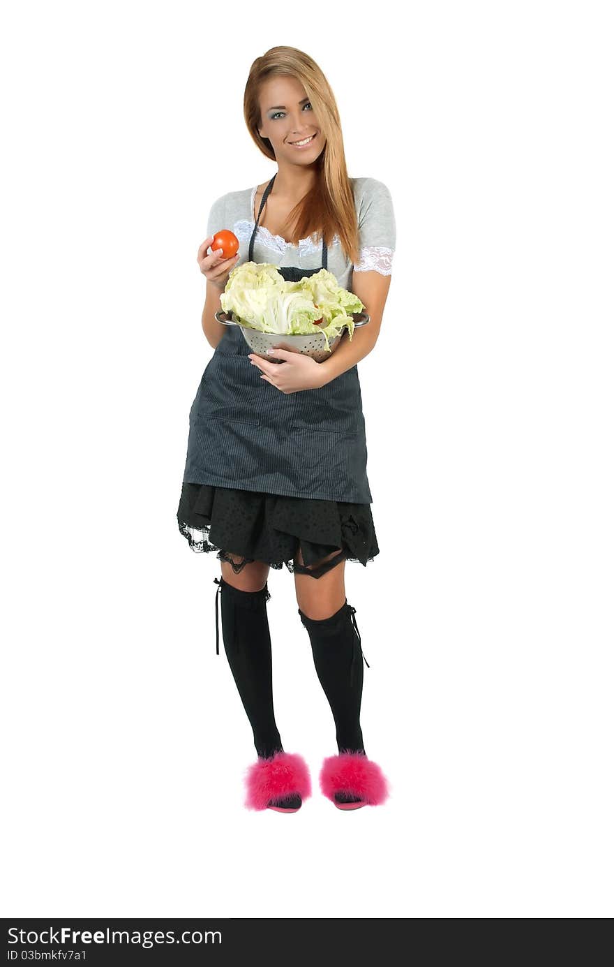 Beautiful housewife holding a pot of healthy food