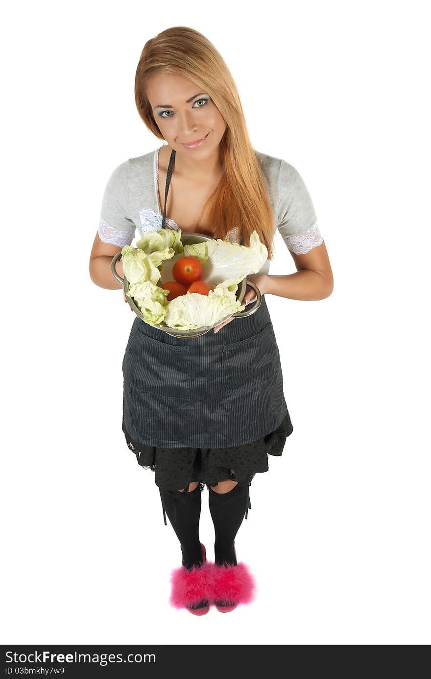 Portrait of happy young woman holding a Pot full of groceries on white background