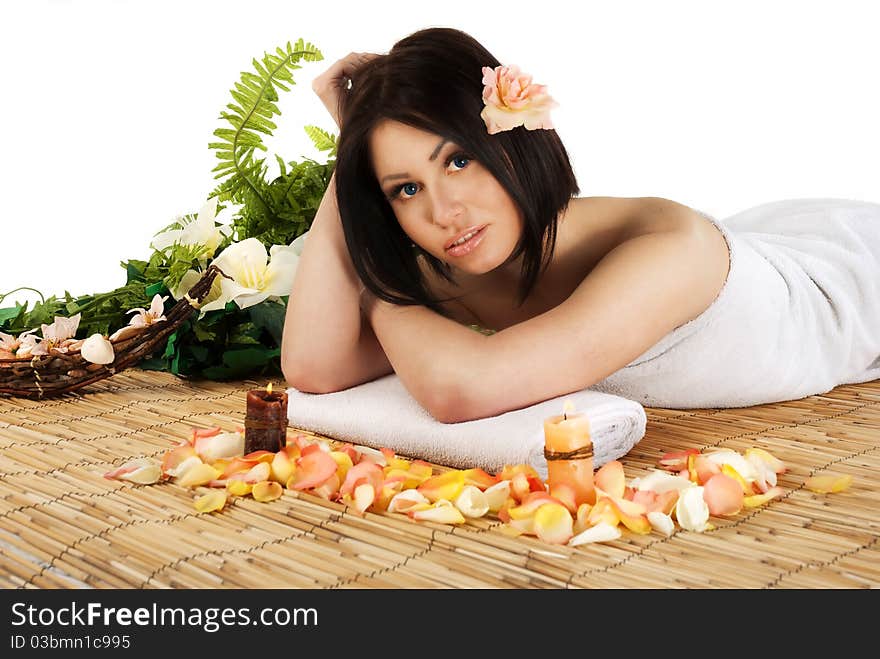 Woman in spa environment against white background. Woman in spa environment against white background