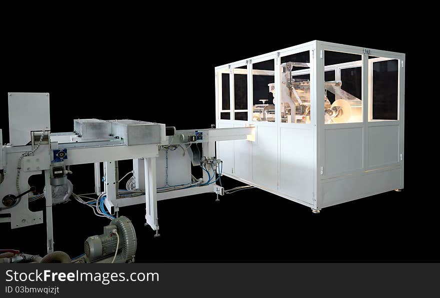 Packaging machine for rolls, serviettes and handkerchiefs.