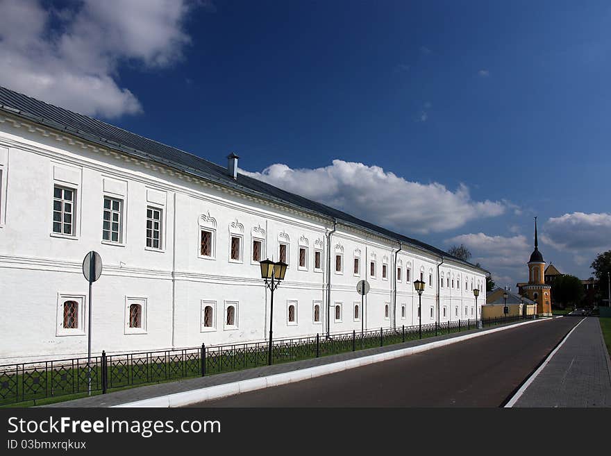 The old white building in the summer, sunny day. The old white building in the summer, sunny day