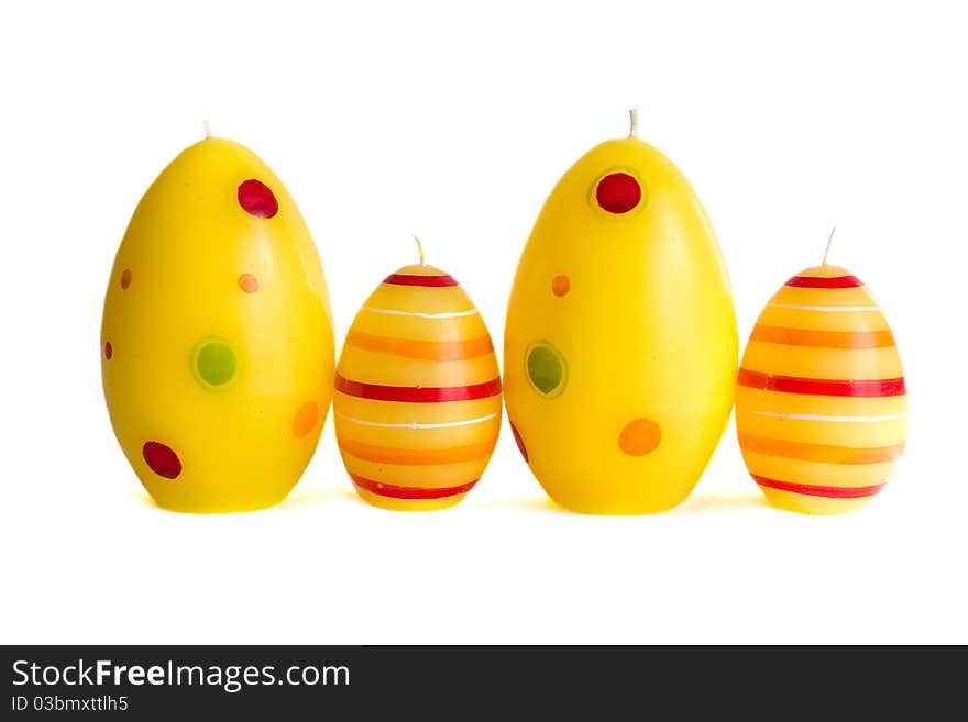 Easter candle yellow and red Eggs. Easter candle yellow and red Eggs