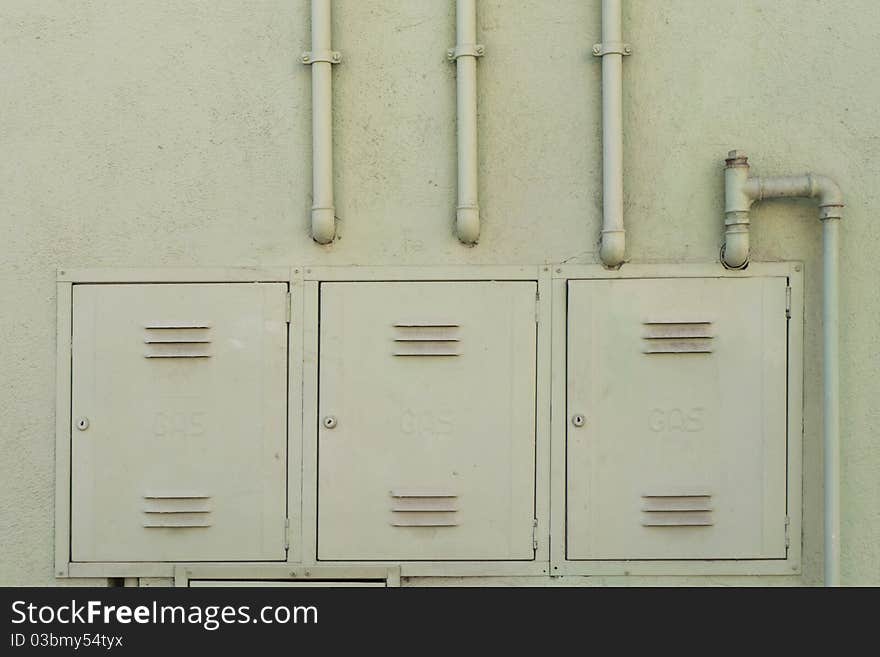 Green wall with gas distribution pipes, private house