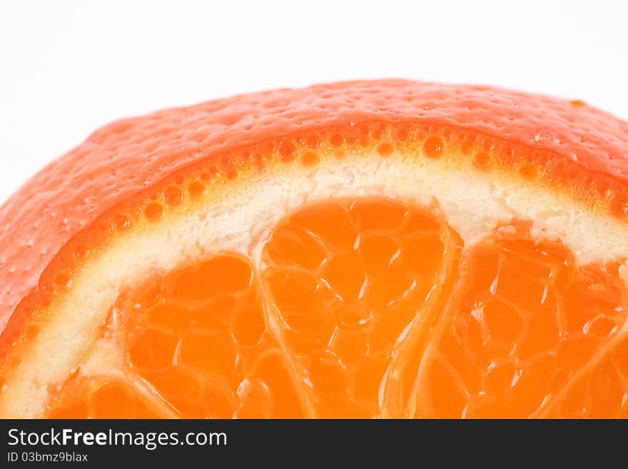 Sliced ​​ripe juicy orange closeup on white background