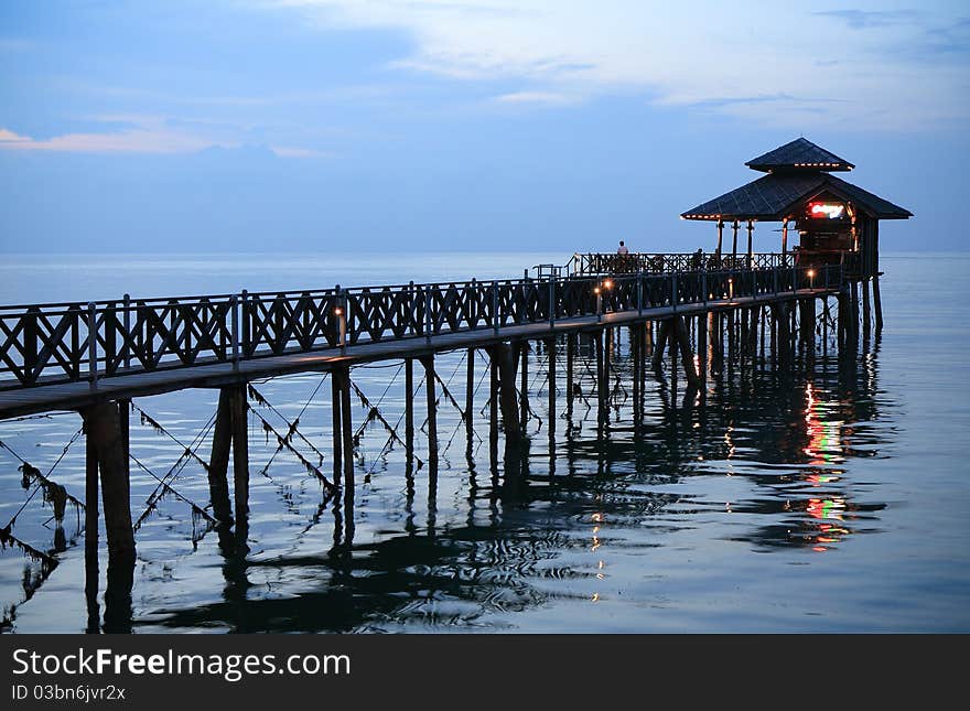 Wooden hut at end of pier