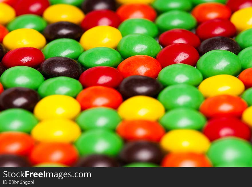 Background of colorful candies coated chocolate sweets