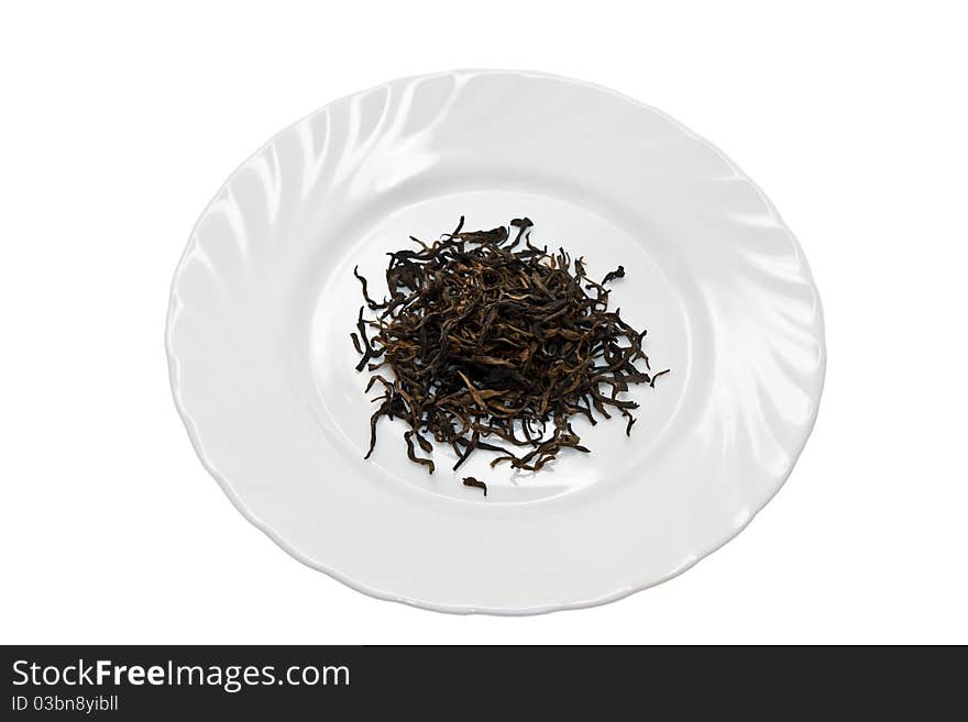 Isolated black tea and plate  on white background