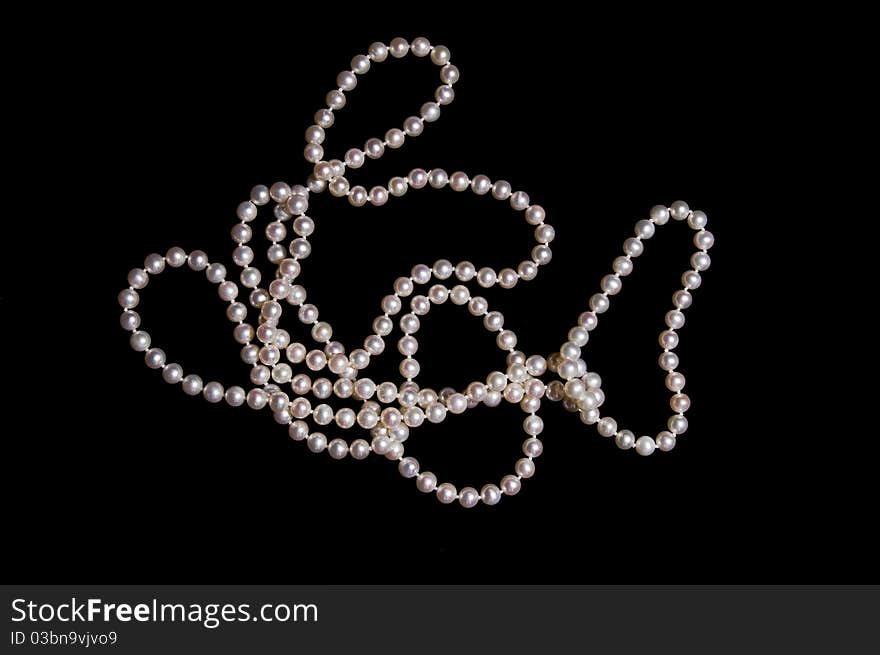 Pearl Beads On A Black