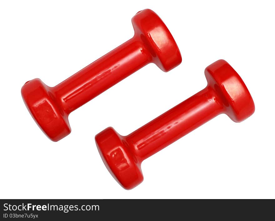 Two red dumbbells isolated