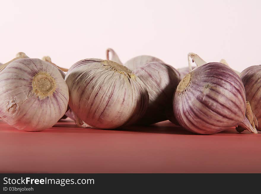 Solo garlic with shell on table. Solo garlic with shell on table.