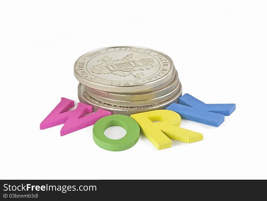 Coin with multi-colored letters on a white background. Coin with multi-colored letters on a white background