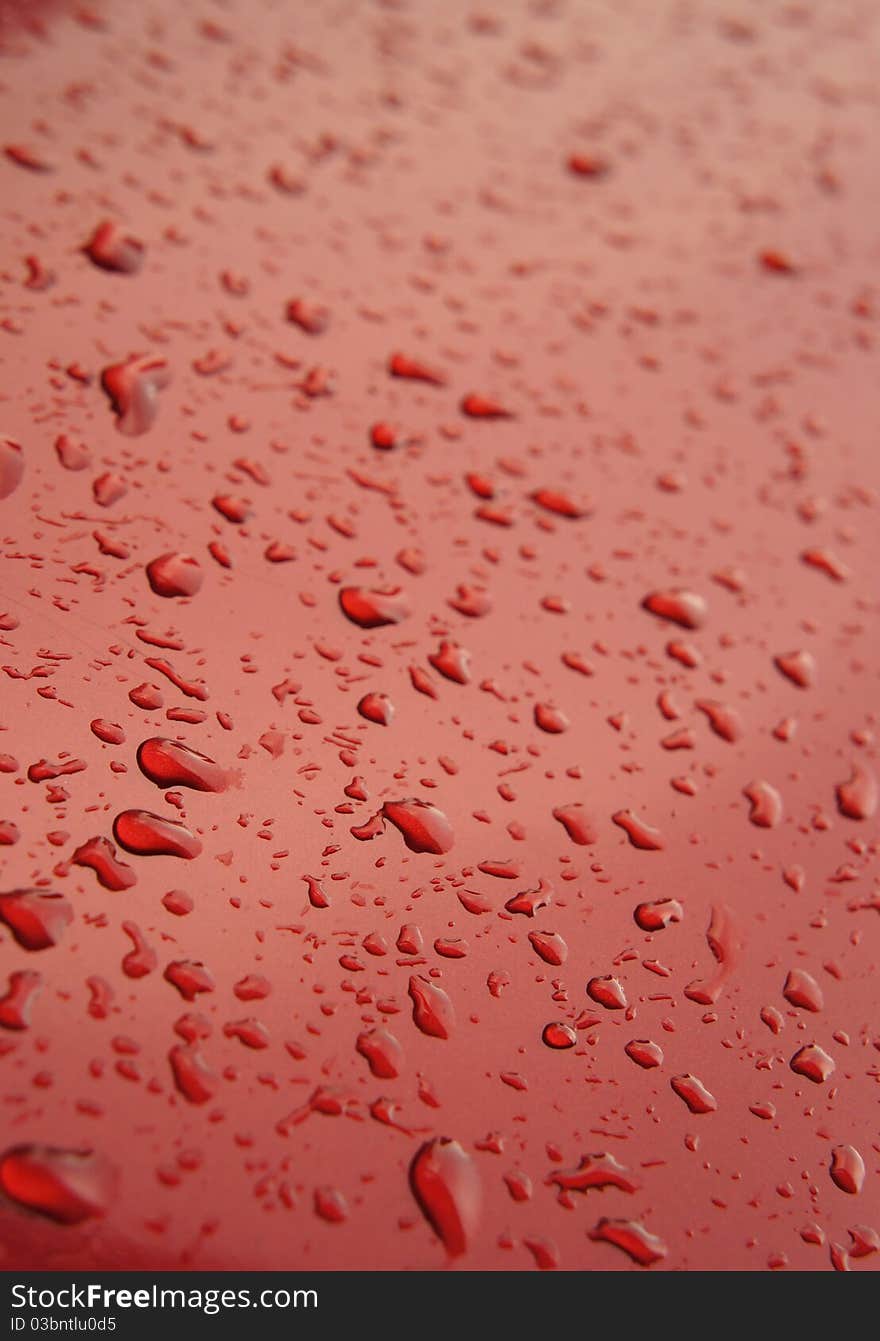 Red water drops background texture